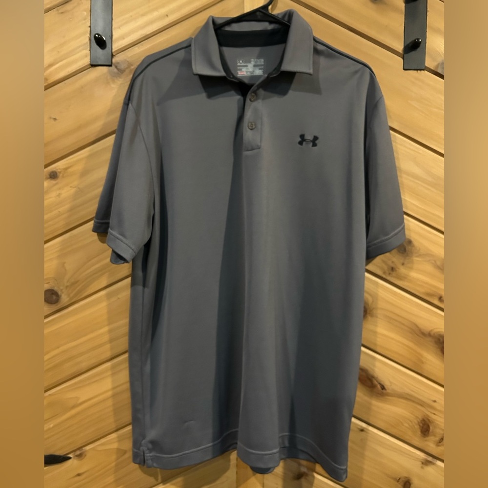Mens Under Armour golf shirt. New without tags.